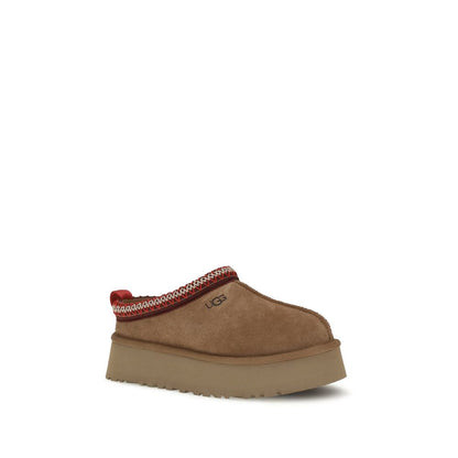Mules Flat Shoes by UGG for women in eva polyester suede leather brown, natural & signature features an captivating silhouette, showcasing the captivating style of the Women's EVA Polyester Suede Leather Mules Flat Shoes with its distinct and refined .