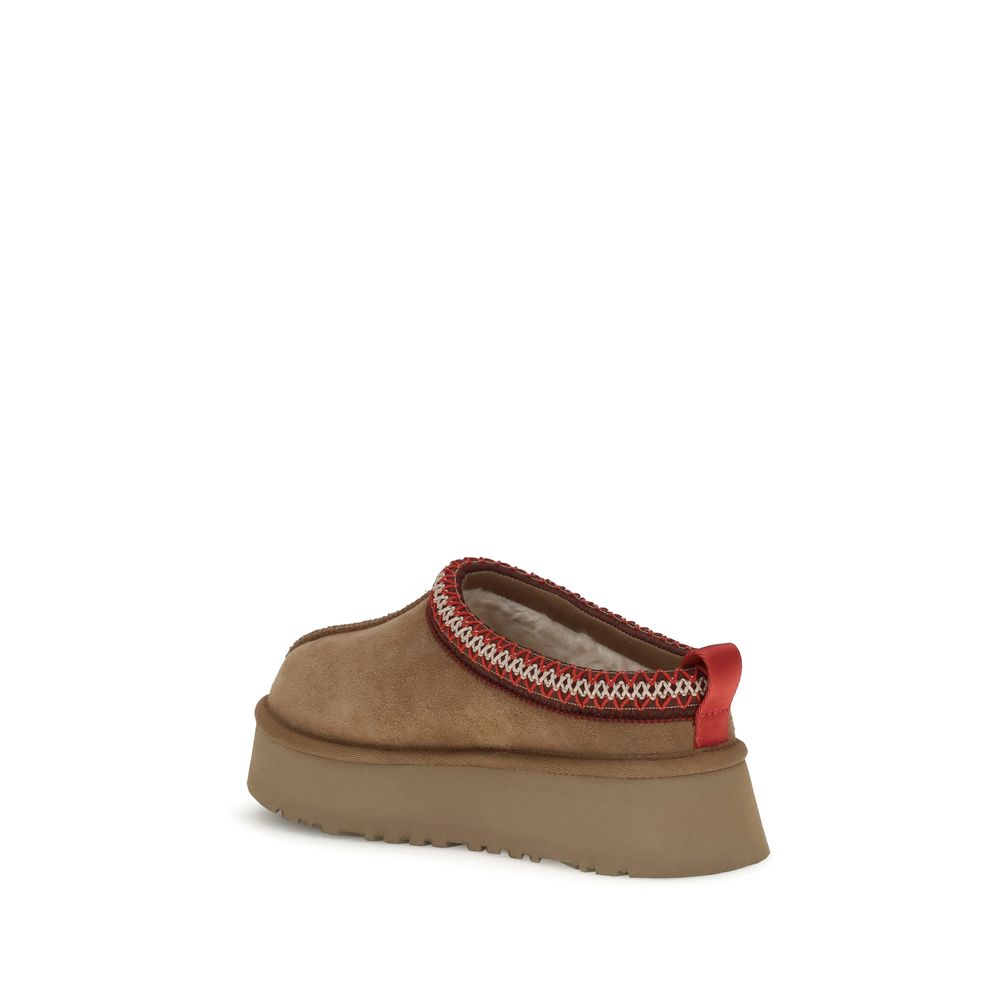 Mules Flat Shoes by UGG for women in eva polyester suede leather brown, natural & signature presents a effortless chic silhouette, showcasing the Women's EVA Polyester Suede Leather Mules Flat Shoes design with a effortless chic and for a sophisticated look.