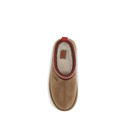 Mules Flat Shoes by UGG for women in eva polyester suede leather brown, natural & signature showcases a resplendent Women's EVA Polyester Suede Leather Mules Flat Shoes aesthetic with a and .