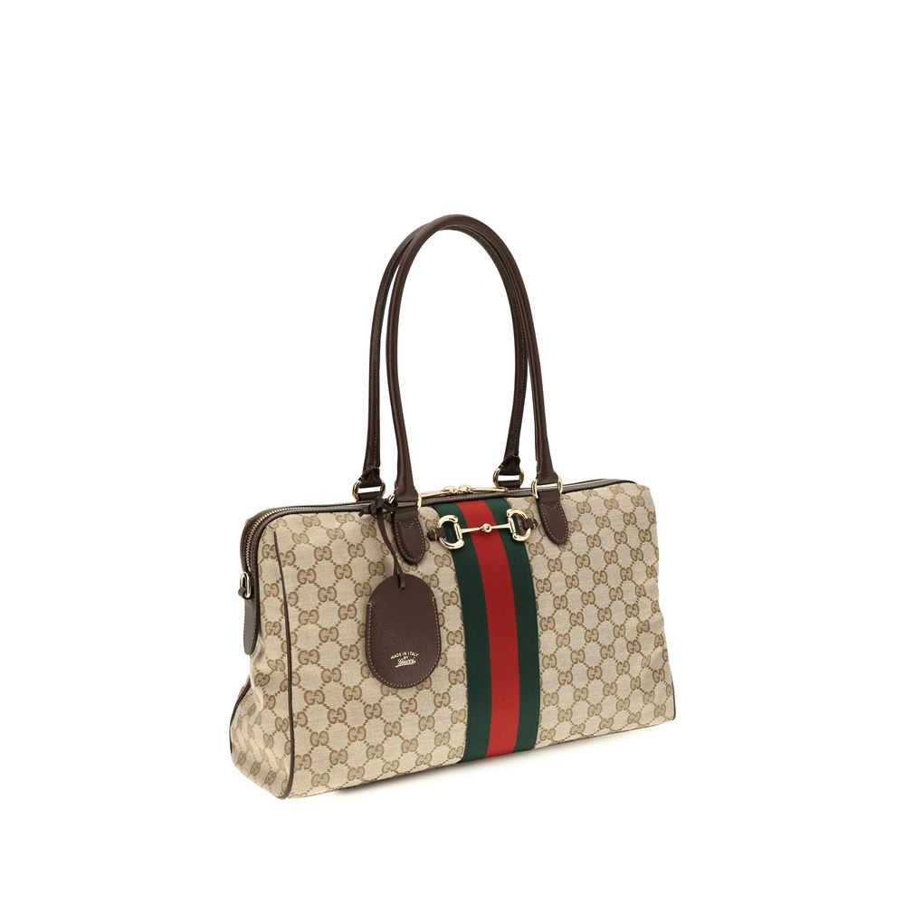 Large Handbag by Gucci for women in polyester leather cotton canvas beige, signature & striped features a contemporary silhouette, showcasing a secure zipper, ample , and contemporary shoulder-strap, handle, adjustable-strap & detachable-strap for a sophisticated look.