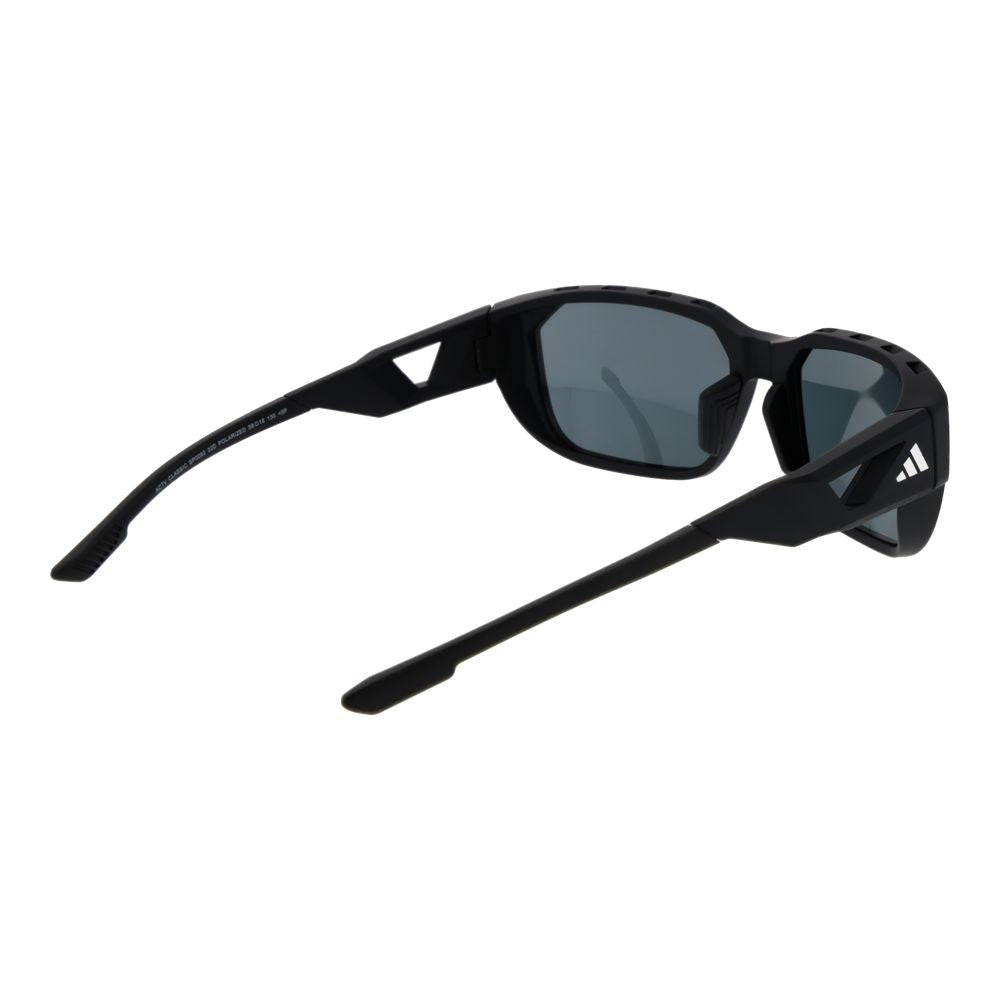 This Sunglasses by Adidas for men in black presents a sumptuous silhouette, showcasing a sumptuous rectangle full-rim frame design in black coloured frame and high-performance polarized category-3-dark-tint lens.