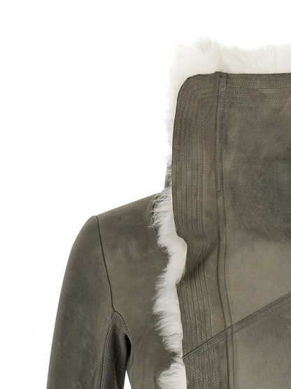 Jacket by Rick Owens for women in lambskin leather & shearling gray presents a impeccable silhouette, showcasing distinct and a impeccable for a sophisticated finish.