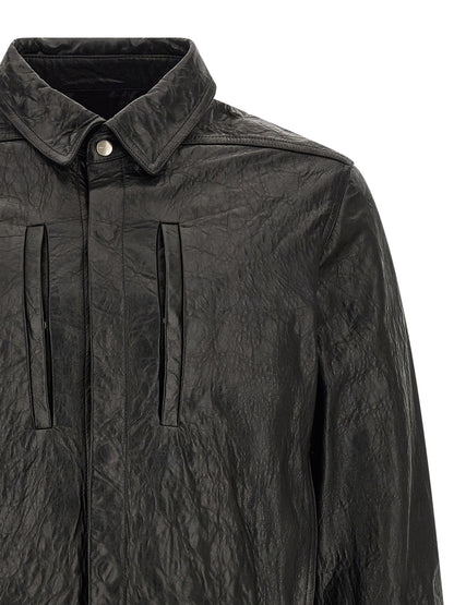 Jacket by Rick Owens for men in lamb leather & cotton black showcases a enveloping silhouette, artfully detailed with a enveloping shirt-collar neckline and premium pockets for a truly enveloping finish.