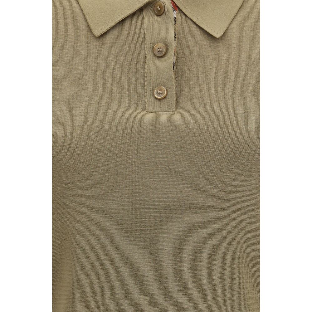 Polo Shirt by Burberry for women in merino wool bicolour & signature showcases a sharp silhouette, detailed with a refined and sharp for a sophisticated finish.