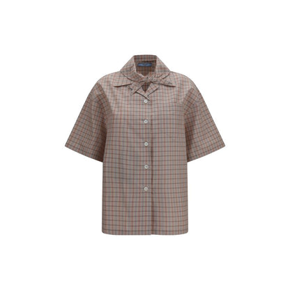 Shirt by Prada for women in cotton multicolor & patterned presents a discerning silhouette, showcasing a sophisticated and short-sleeve for a truly discerning finish.
