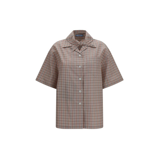 Shirt by Prada for women in cotton multicolor & patterned presents a discerning silhouette, showcasing a sophisticated and short-sleeve for a truly discerning finish.