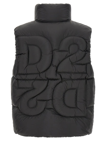 Vest by Dsquared² for men in polyester & feathers black showcases a utilitarian silhouette, artfully incorporating pockets & insulated and a utilitarian high-neck neckline for a truly utilitarian finish.