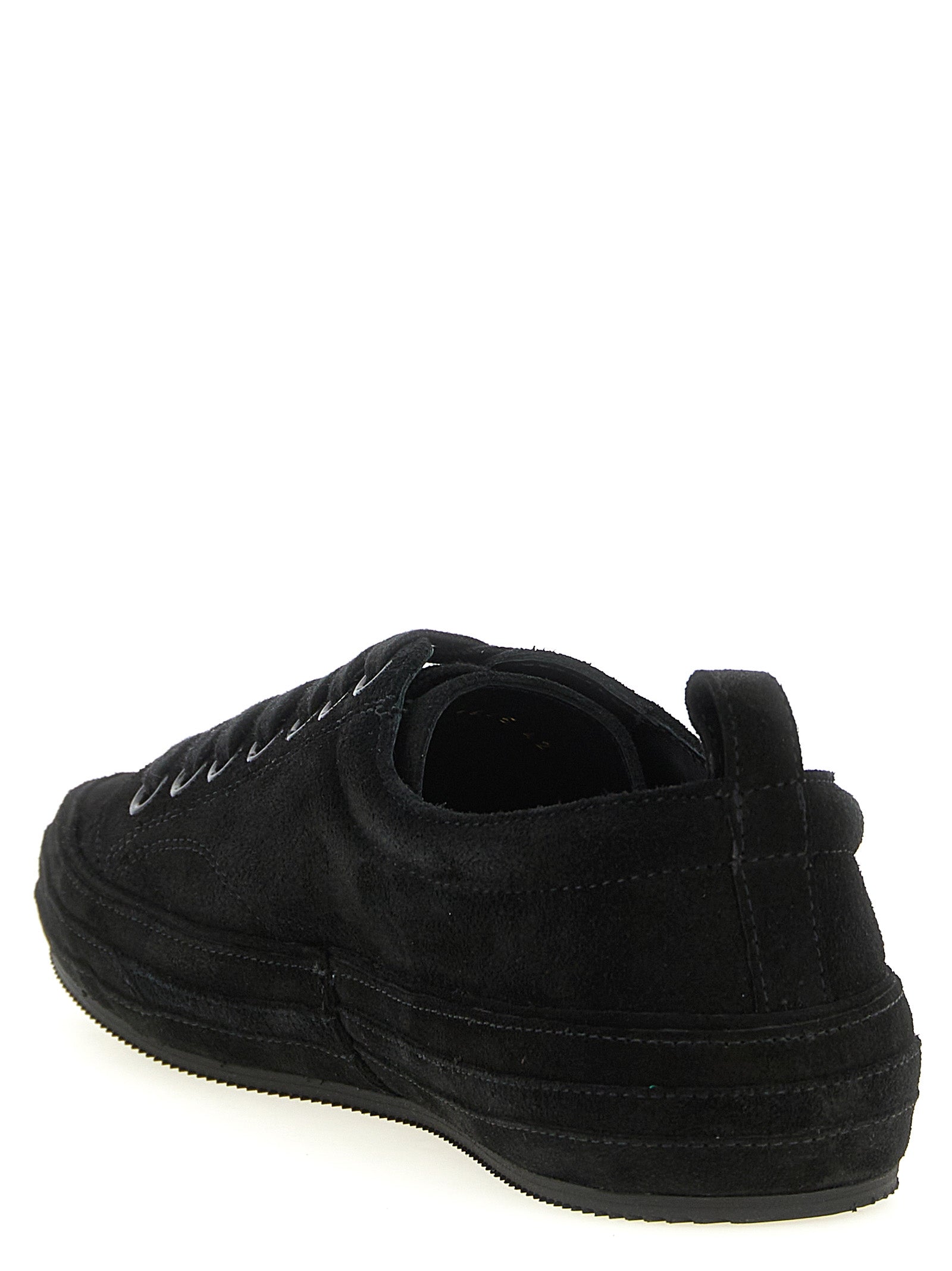 Sneakers by Tom Ford for men in suede leather brass & cotton black features a chic design, perfectly showcasing the chic low-top style of this Men's Low Top Suede Leather Brass & Cotton Sneakers.