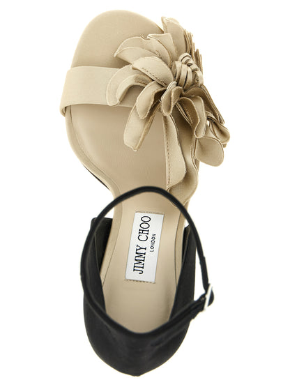 Stiletto Ankle Strap Sandals by Jimmy Choo for women in polyester leather & silk black, multicolor, silver & floral presents a sculptural silhouette, showcasing the Women's Polyester Leather & Silk Stiletto Ankle Strap Sandals design with a sculptural stiletto and for a premium look.