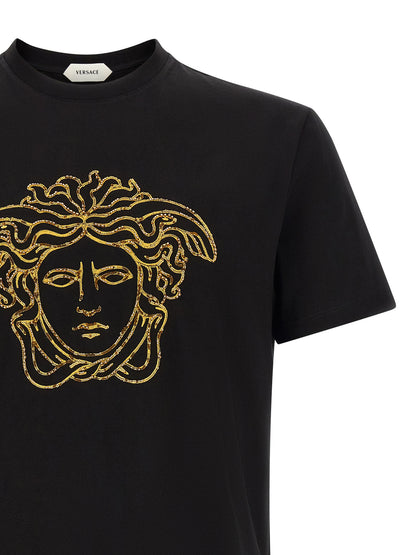 T-Shirt by Versace for men in cotton black & gold features an edgy silhouette, meticulously detailed with a sophisticated and crew neckline for a truly edgy finish.