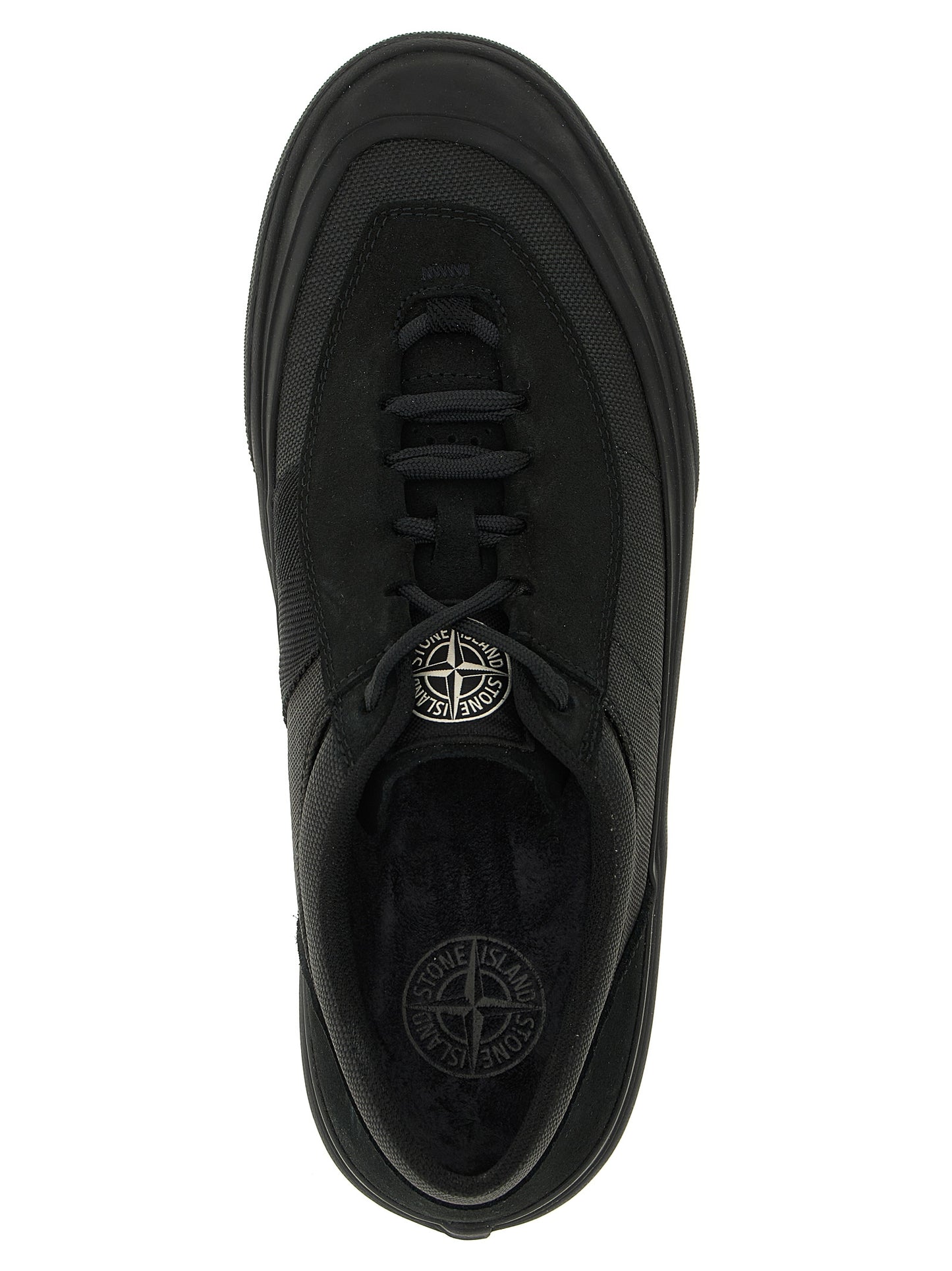 Sneakers by Stone Island for men in linen cotton canvas & suede leather black & signature presents a sumptuous silhouette, artfully capturing the essence of the Men's Low Top Linen Cotton Canvas & Suede Leather Sneakers with its sumptuous low-top style design.