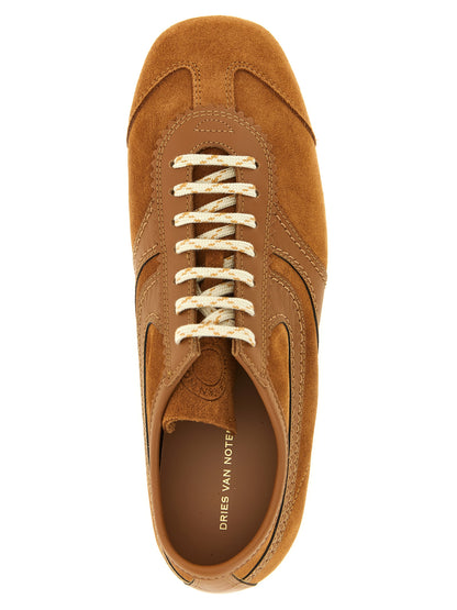 Sneakers by Dries Van Noten for women in suede calfskin leather brown & patterned presents a sumptuous silhouette, artfully capturing the essence of the Women's Low Top Suede Calfskin Leather Sneakers with its sumptuous low-top style design.