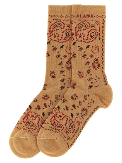 These Socks by Alanui for women in stretch polyamide cotton beige, black, camel, red, patterned, paisley, jacquard & signature present a utilitarian silhouette from the Women's Stretch Polyamide Cotton Socks collection, offering a utilitarian fit and refined aesthetic.