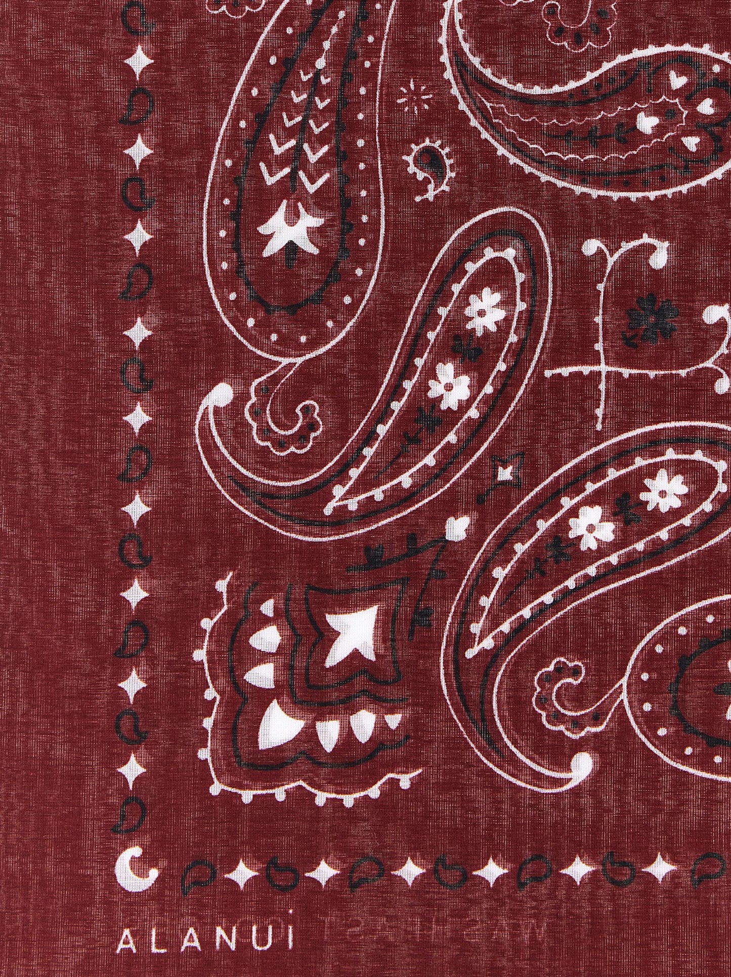 Scarf by Alanui for women in cotton canvas black, bordeaux, red, white, paisley & print showcases a warm silhouette from the Cotton Canvas Scarf collection, offering a warm drape that exudes sophisticated luxury.