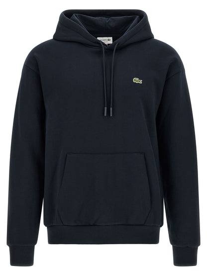 Sweatshirt Hoodie by Lacoste for men in poly cotton & crocodile skin leather blue showcases a city-ready silhouette, artfully detailed with a signature hooded neckline and for a city-ready finish.