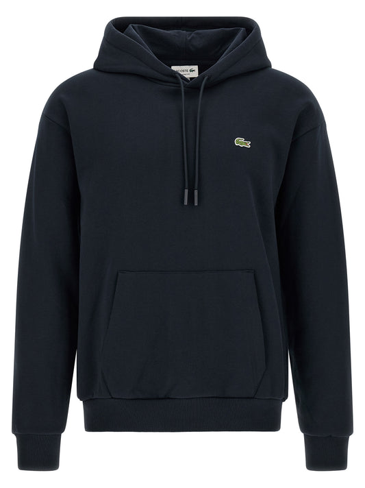 Sweatshirt Hoodie by Lacoste for men in poly cotton & crocodile skin leather blue showcases a city-ready silhouette, artfully detailed with a signature hooded neckline and for a city-ready finish.