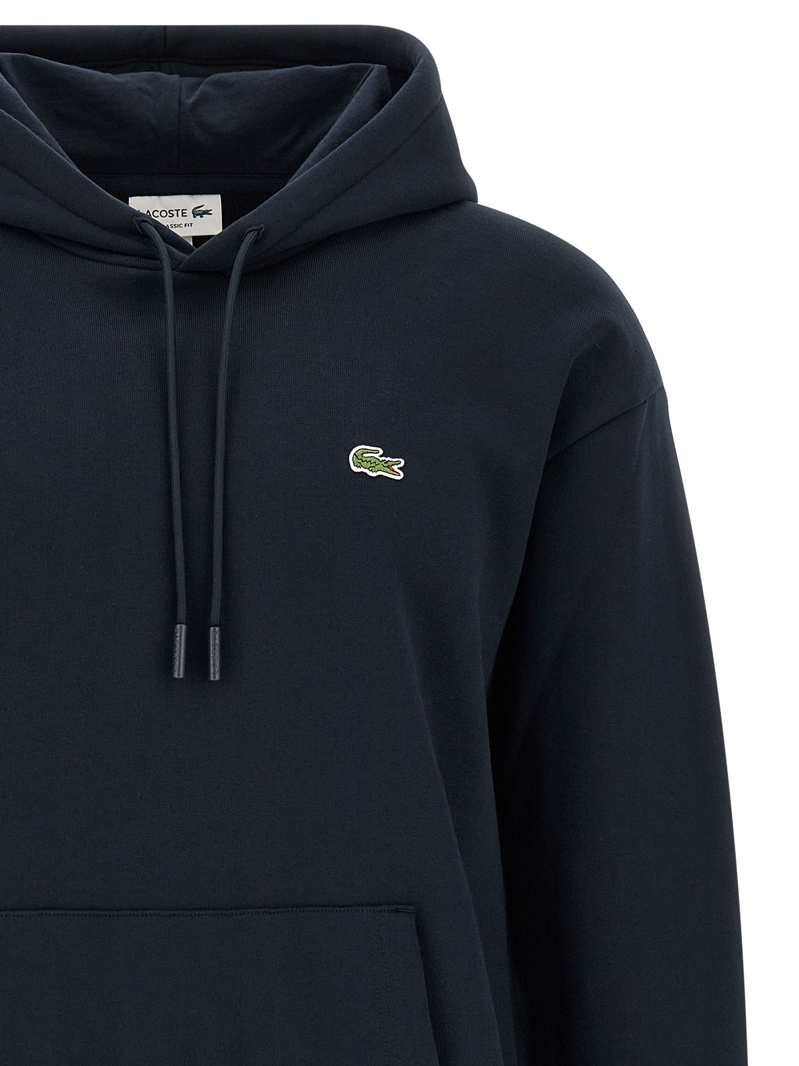Sweatshirt Hoodie by Lacoste for men in poly cotton & crocodile skin leather blue features an avant-garde silhouette, showcasing a sophisticated hooded neckline and detail for a truly avant-garde finish.