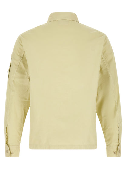 Overshirt by C.P. Company for men in cotton beige & sand presents a discerning silhouette, showcasing a sophisticated and for a truly discerning finish.
