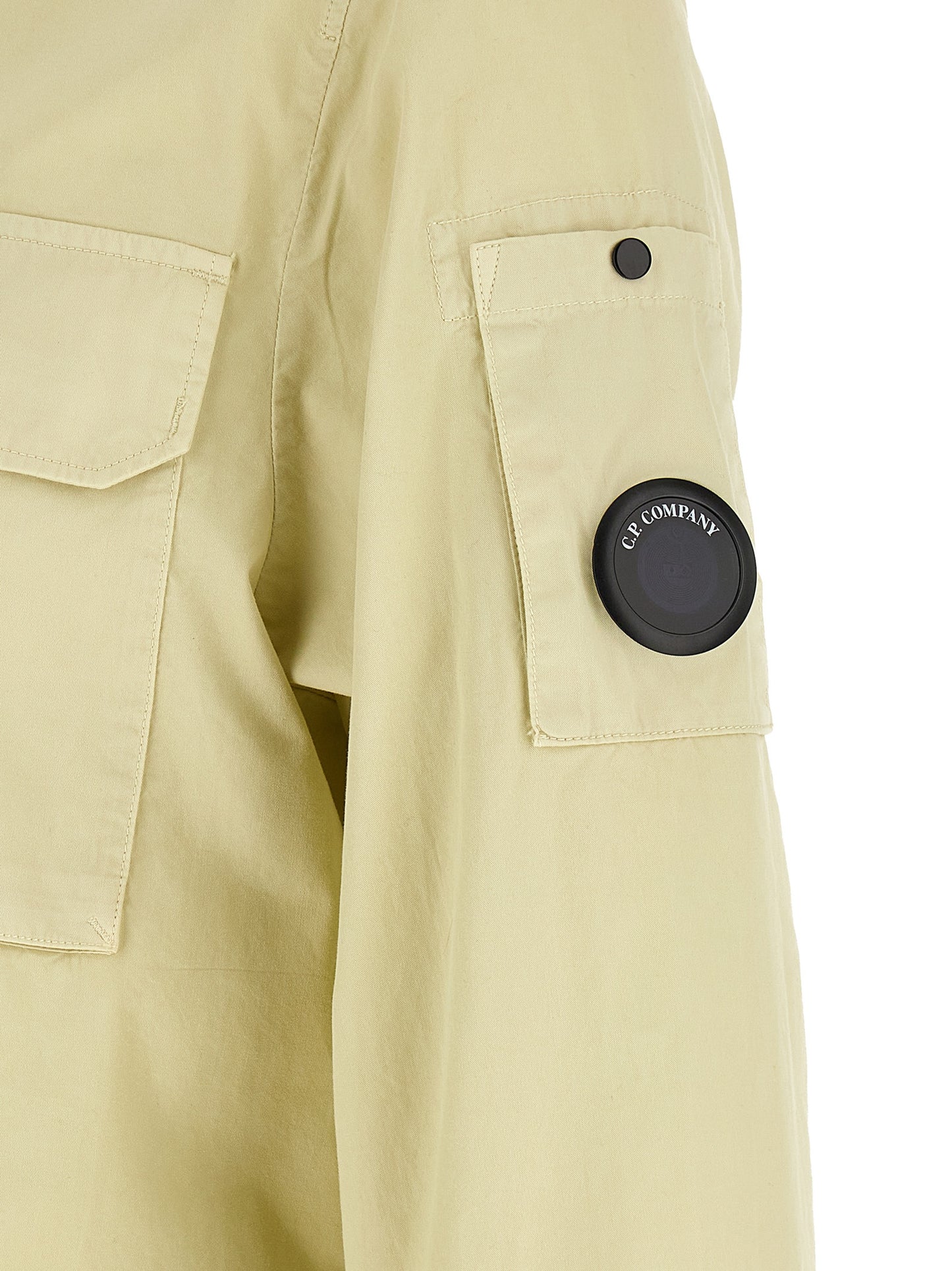 Overshirt by C.P. Company for men in cotton beige & sand showcases a sharp silhouette, elegantly detailed with a sharp and sharp .