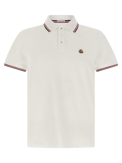 This Polo Shirt by Moncler for men in cotton felt white & striped presents a flawless silhouette, showcasing flawless detailing and a refined for a truly flawless aesthetic.