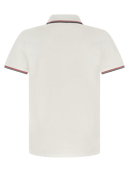 Polo Shirt by Moncler for men in cotton felt white & striped showcases a sharp silhouette, detailed with a refined and sharp for a sophisticated finish.