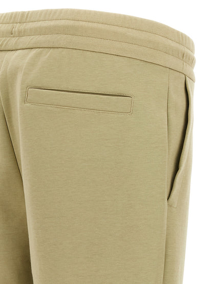 Joggers by Hugo Boss for men in cotton polyester beige & monogram features an sophisticated and with a precise long, creating a sophisticated and sophisticated silhouette.