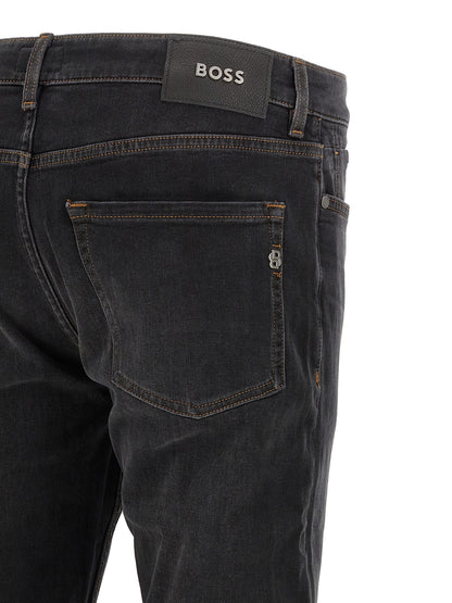 Jeans by Hugo Boss for men in stretch denim cotton black & monogram presents a tailored silhouette, showcasing a tailored straight-leg & regular-fit and long cut with a refined for a truly tailored aesthetic.