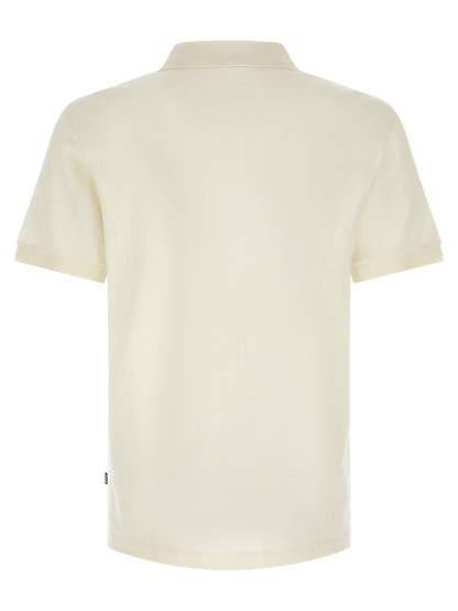 Polo Shirt by Hugo Boss for men in cotton white showcases a sharp silhouette, detailed with a refined and sharp for a sophisticated finish.
