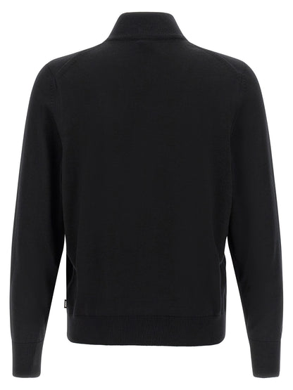 Cardigan by Hugo Boss for men in virgin wool black features an crisp silhouette, showcasing a sophisticated high-neck neckline and detail for a truly crisp finish.