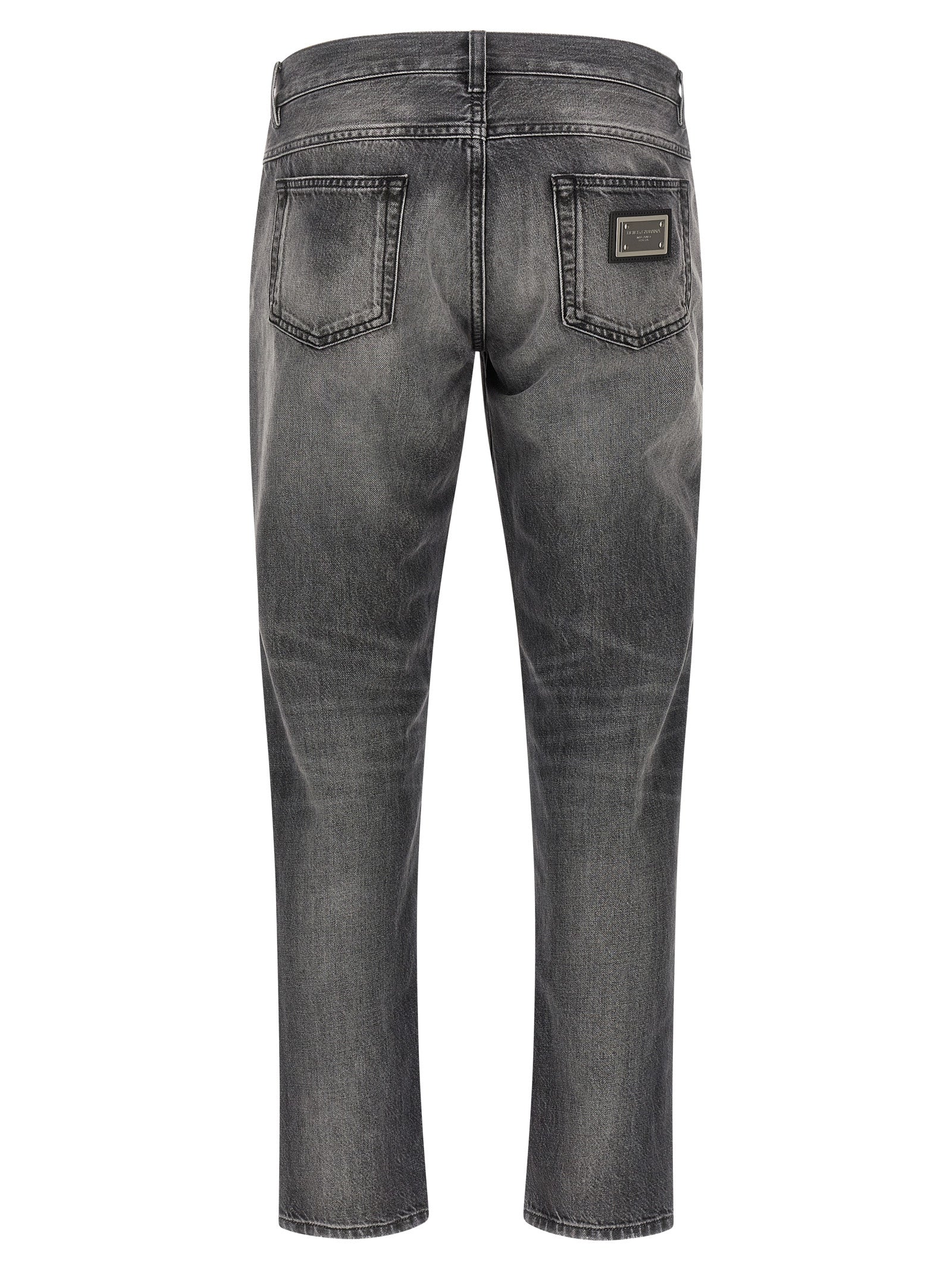 Jeans by Dolce & Gabbana for men in denim cotton gray features an sartorial and long with a cut for a sartorial finish.