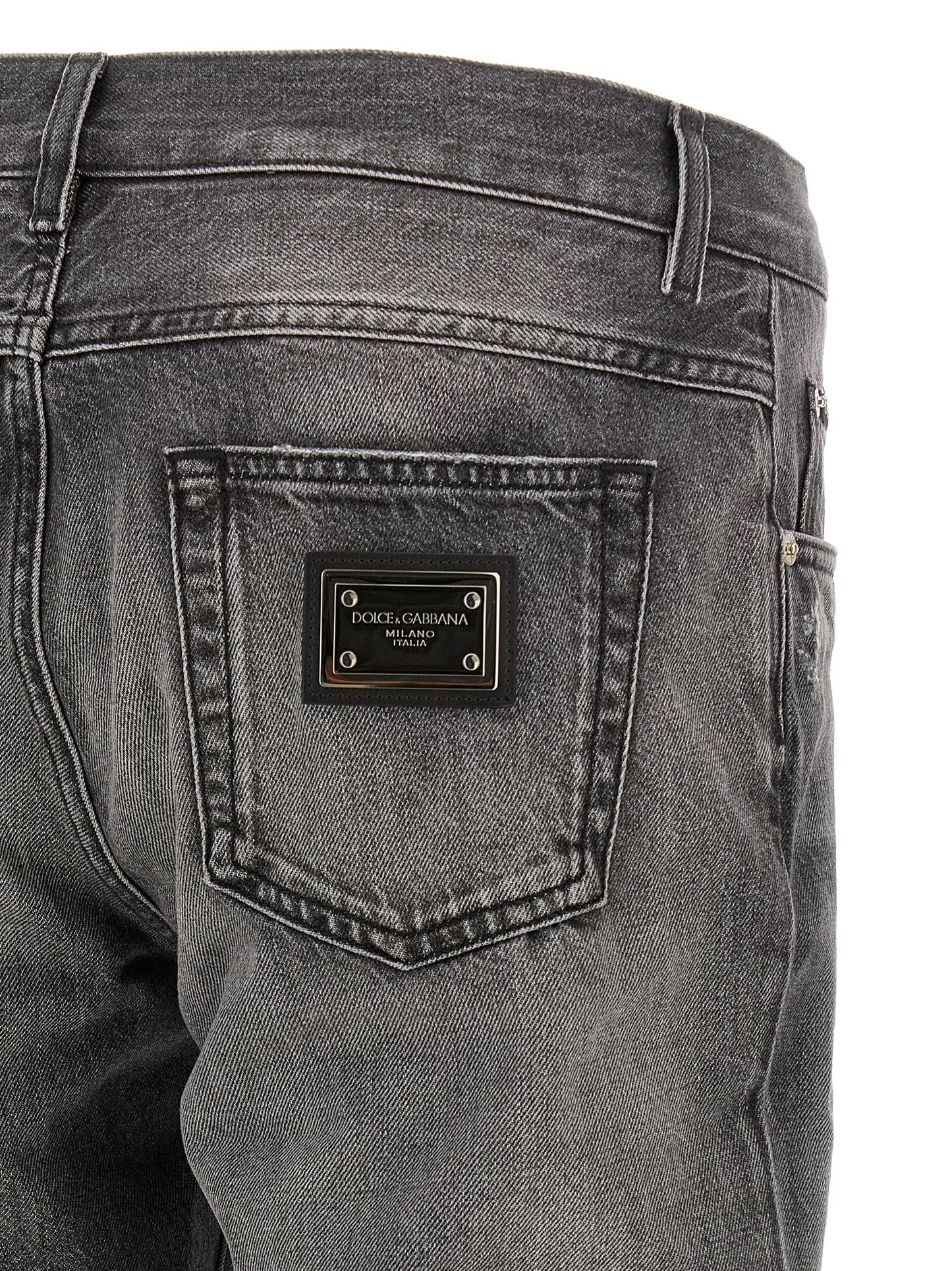 Jeans by Dolce & Gabbana for men in denim cotton gray features a polished silhouette with a polished , reaching a polished long and finished with a polished .