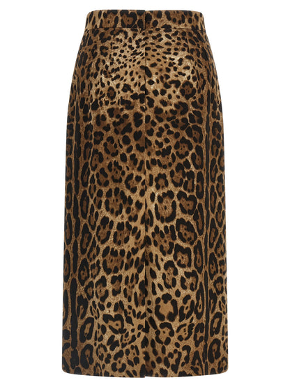 Skirt by Dolce & Gabbana for women in stretch viscose brown, leopard-print & print showcases a sultry silhouette, elegantly defined by its midi and the sophisticated sultry design of the Women's High Rise Stretch Viscose Skirt.