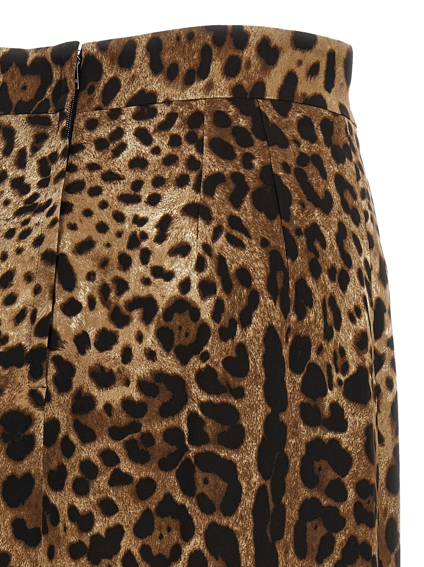 Skirt by Dolce & Gabbana for women in stretch viscose brown, leopard-print & print showcases a dramatic silhouette, artfully capturing the essence of the Women's High Rise Stretch Viscose Skirt in a dramatic midi cut for a refined look.