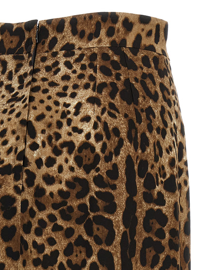 Skirt by Dolce & Gabbana for women in stretch viscose brown, leopard-print & print showcases a dramatic silhouette, artfully capturing the essence of the Women's High Rise Stretch Viscose Skirt in a dramatic midi cut for a refined look.
