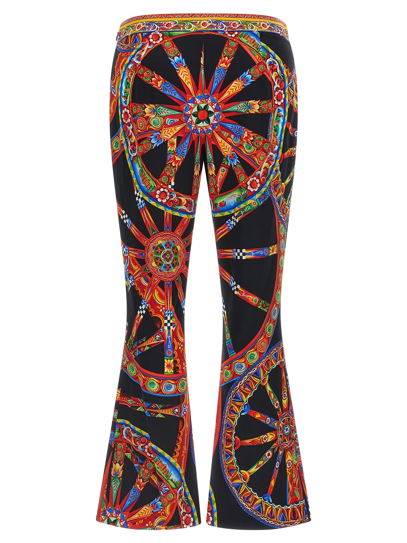 Trousers by Dolce & Gabbana for women in silk multicolor, natural, patterned, floral & print presents a smart silhouette, meticulously detailed with a smart flared, a smart long, and a smart .