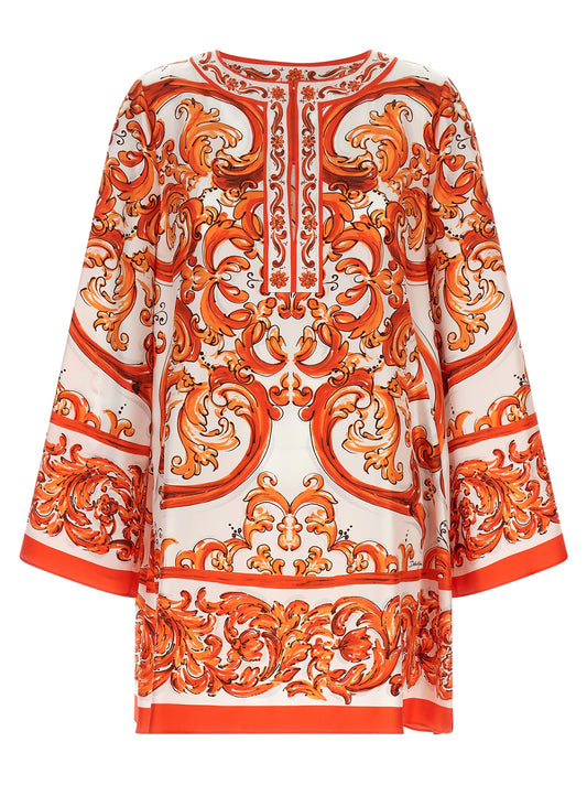 Dress by Dolce & Gabbana for women in silk twill orange, white, patterned & print features an sultry silhouette defined by a split neckline and , falling to an sultry short mini for a sultry look.