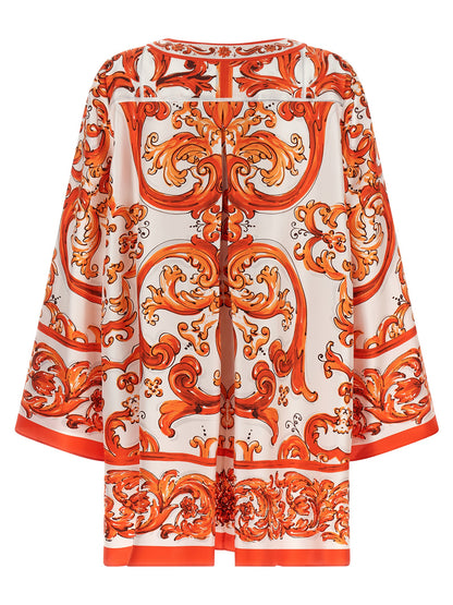 Dress by Dolce & Gabbana for women in silk twill orange, white, patterned & print presents a sinuous silhouette, showcasing a sophisticated split neckline and detailed with a sinuous short mini for a refined finish.