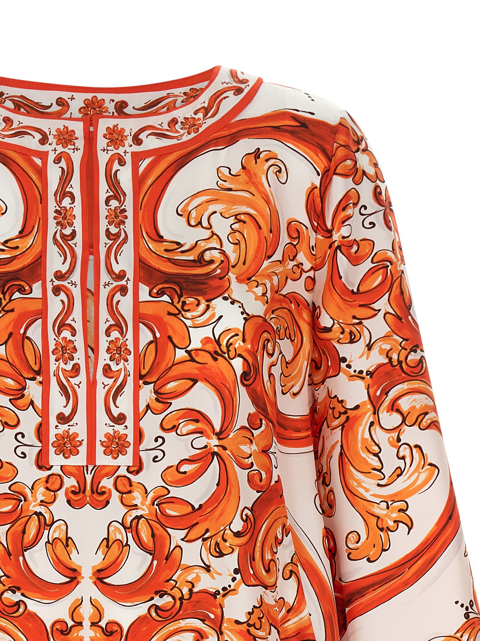 Dress by Dolce & Gabbana for women in silk twill orange, white, patterned & print showcases a striking silhouette, elegantly detailed with a , refined split neckline, and a striking short mini for a striking finish.