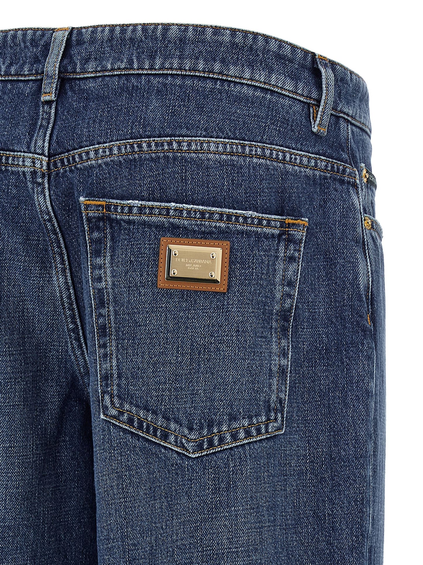 Jeans by Dolce & Gabbana for women in denim cotton blue, gold & signature features an refined tailoring silhouette, showcasing a premium straight-leg, relaxed-fit & wide with a and long cut for a refined tailoring look.
