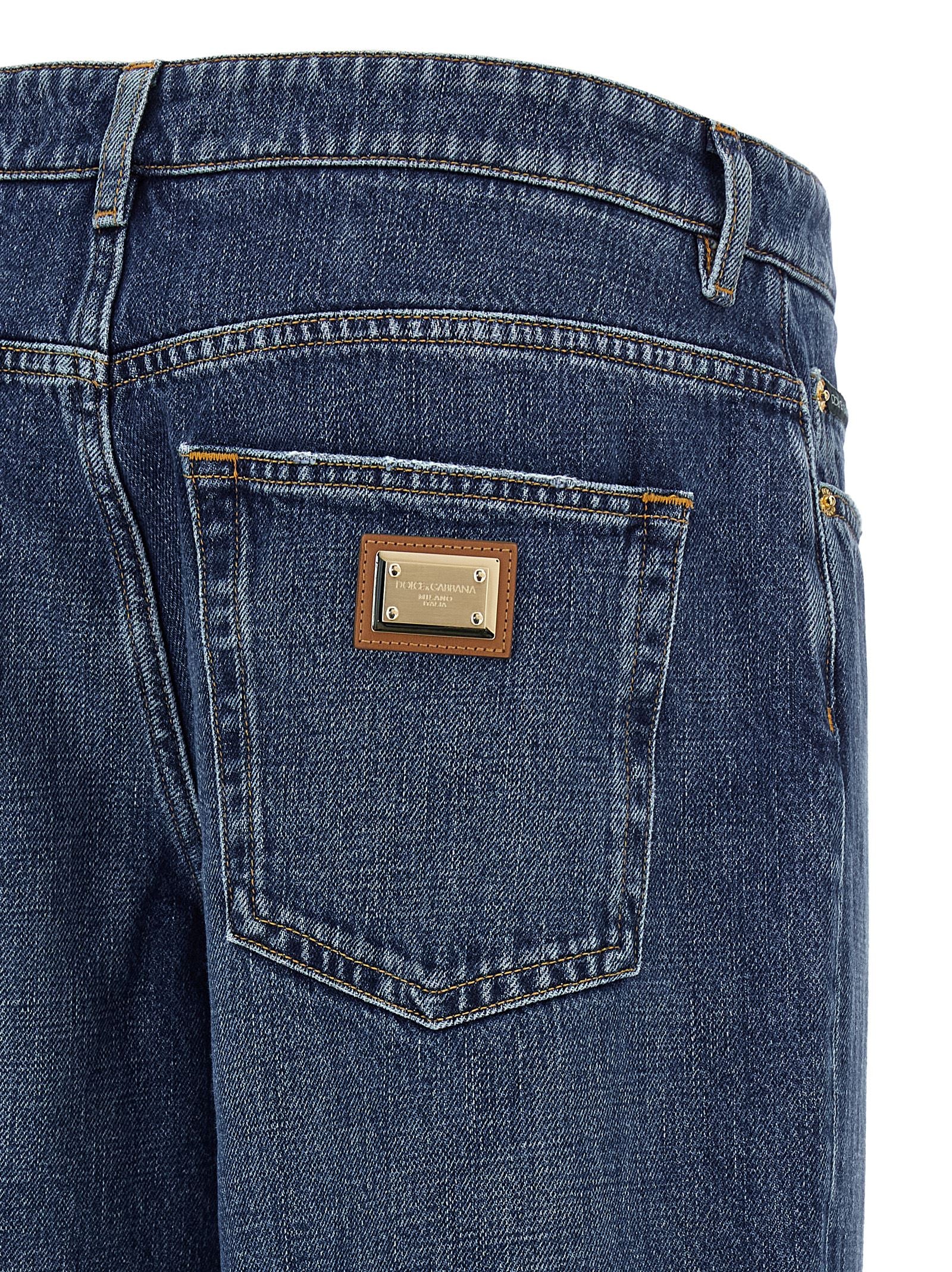 Jeans by Dolce & Gabbana for women in denim cotton blue, gold & signature features an refined tailoring silhouette, showcasing a premium straight-leg, relaxed-fit & wide with a and long cut for a refined tailoring look.