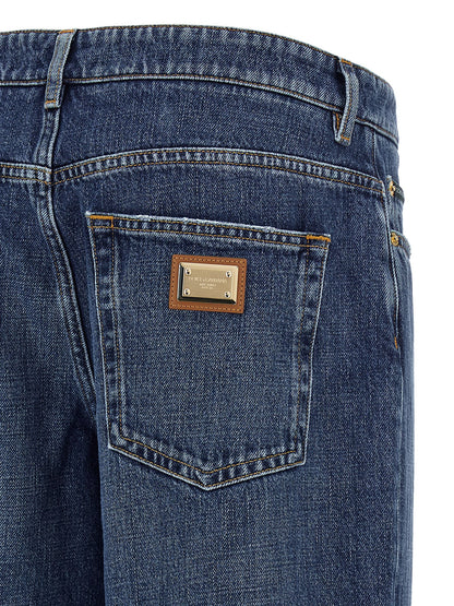 Jeans by Dolce & Gabbana for women in denim cotton blue, gold & signature features an refined tailoring silhouette, showcasing a premium straight-leg, relaxed-fit & wide with a and long cut for a refined tailoring look.