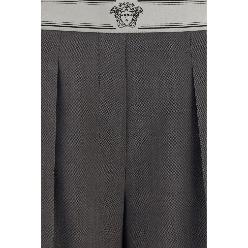 Pants by Versace for women in mohair & merino wool gray, jacquard & signature features a sleek silhouette with a sleek straight-leg & regular-fit, a refined long, and a sophisticated finish.