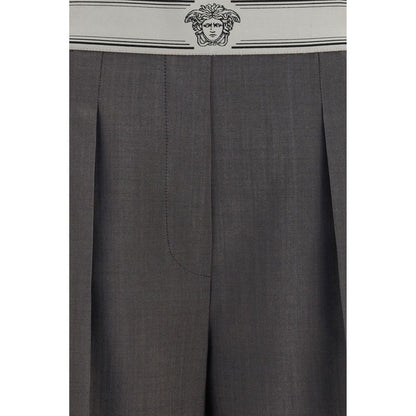 Pants by Versace for women in mohair & merino wool gray, jacquard & signature features a sleek silhouette with a sleek straight-leg & regular-fit, a refined long, and a sophisticated finish.