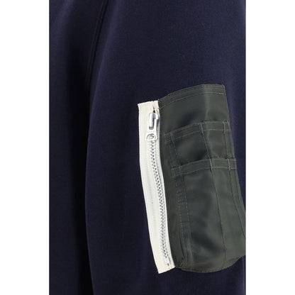 This Polo Shirt by Sacai for men in polyester cotton terry cloth blue & signature presents a flawless silhouette, showcasing flawless detailing and a refined for a truly flawless aesthetic.
