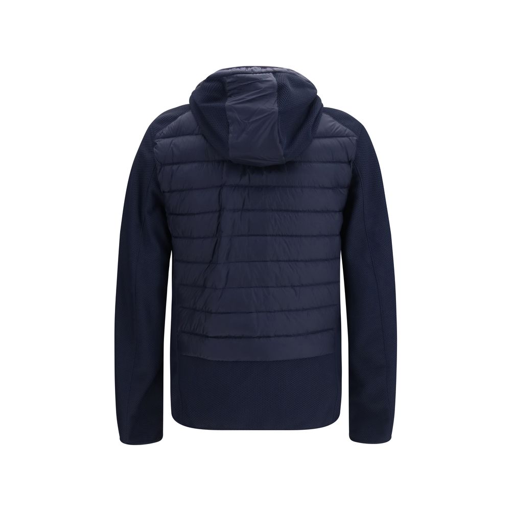This Hooded Parka by Parajumpers for men in polyester polyamide duck & goose down blue & yellow presents a enveloping silhouette, meticulously detailed with pockets, hooded & insulated and a enveloping hooded neckline.