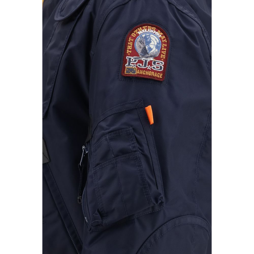 This Hooded Bomber Jacket by Parajumpers for men in nylon & polyurethane blue & yellow exhibits a edgy silhouette, meticulously detailed with functional pockets & hooded and a edgy hooded neckline for a edgy finish.