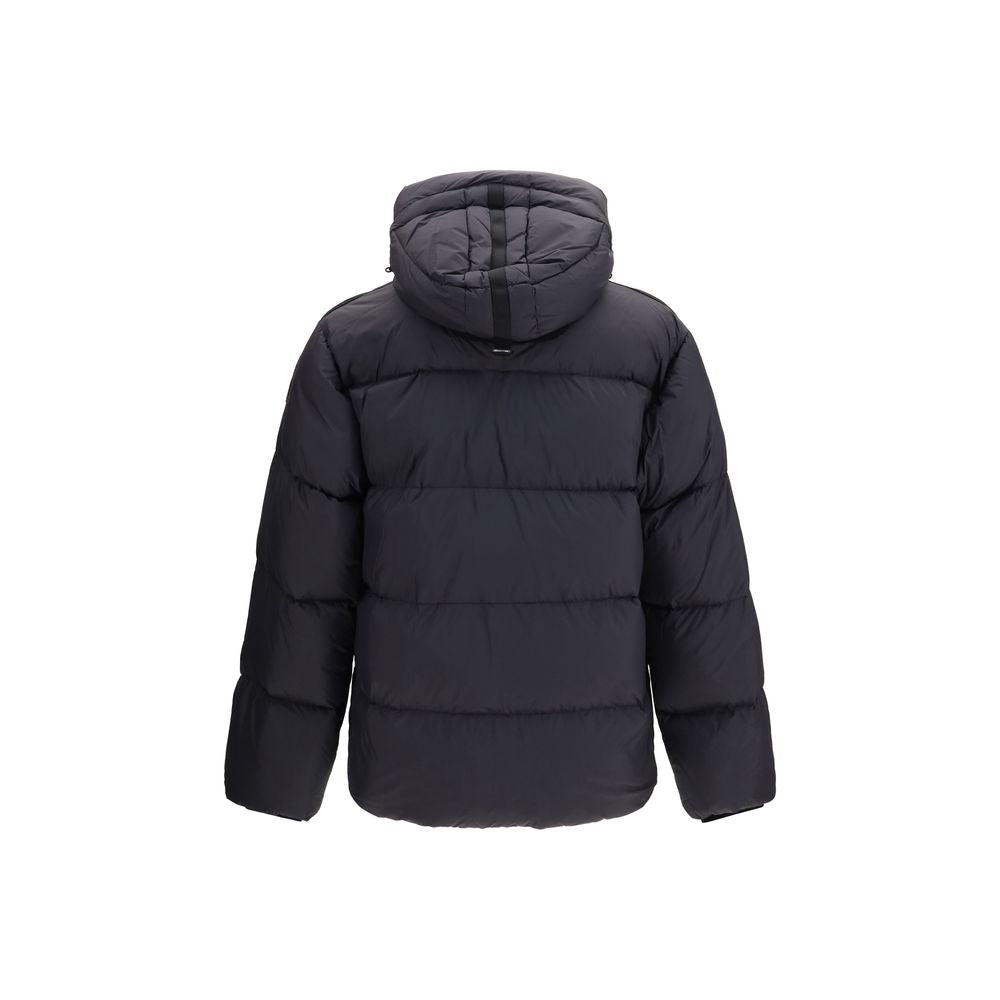 Hooded Overcoat by Parajumpers for men in cordura nylon duck & goose down black & yellow presents a luxurious silhouette, showcasing a luxurious hooded neckline and sophisticated windproof, lightweight, pockets, hooded & insulated for a premium, luxurious look.