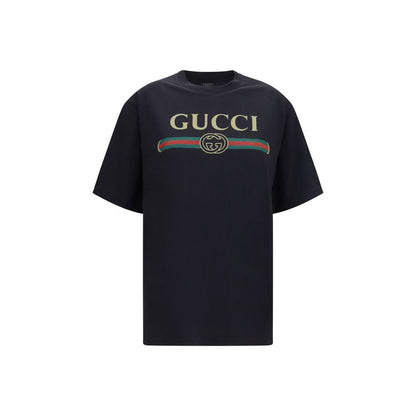 T-Shirt by Gucci for women in cotton & silk black & print features an edgy silhouette, meticulously detailed with a sophisticated short-sleeve and crew neckline for a truly edgy finish.