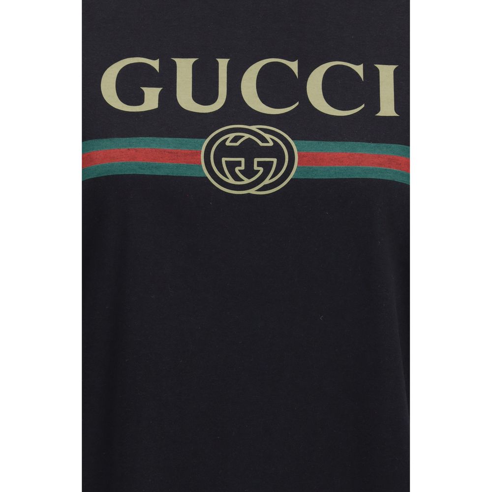 T-Shirt by Gucci for women in cotton & silk black & print showcases a dramatic silhouette, elegantly detailed with a dramatic and for a truly dramatic finish.