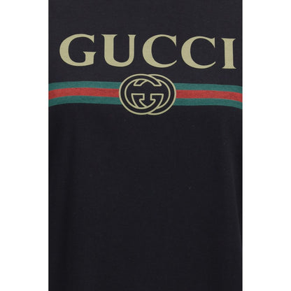 T-Shirt by Gucci for women in cotton & silk black & print showcases a dramatic silhouette, elegantly detailed with a dramatic and for a truly dramatic finish.